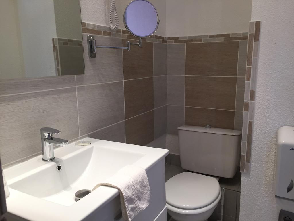 Hotel Le Faisan Монлюсон Экстерьер фото