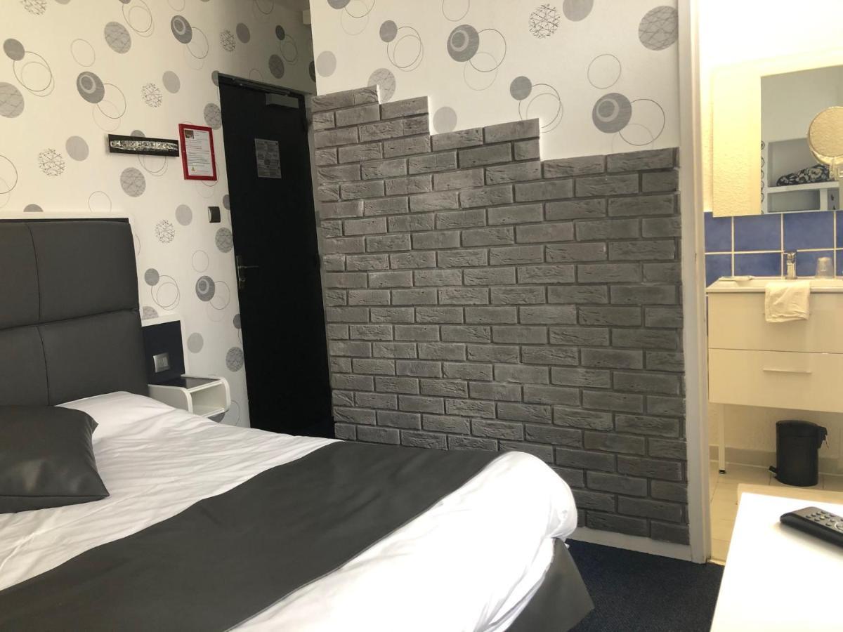 Hotel Le Faisan Монлюсон Экстерьер фото