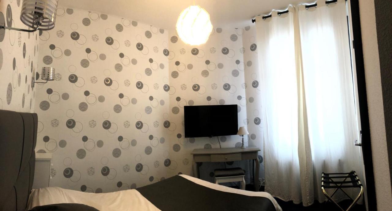 Hotel Le Faisan Монлюсон Экстерьер фото